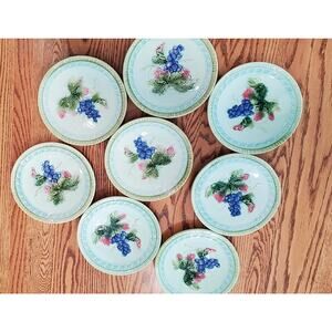 This beautiful set of eight gape-and-leaf motif German majolica plates